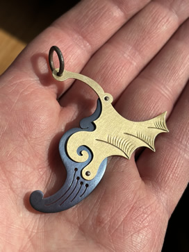 Steel Jewelry with bronze and rivet construction by Jesse Bert at Tacoma Metal Arts